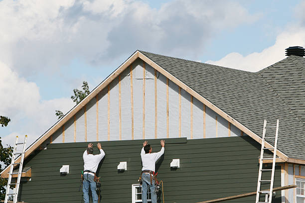 Professional Siding Installation technician working in Oceanside, NY